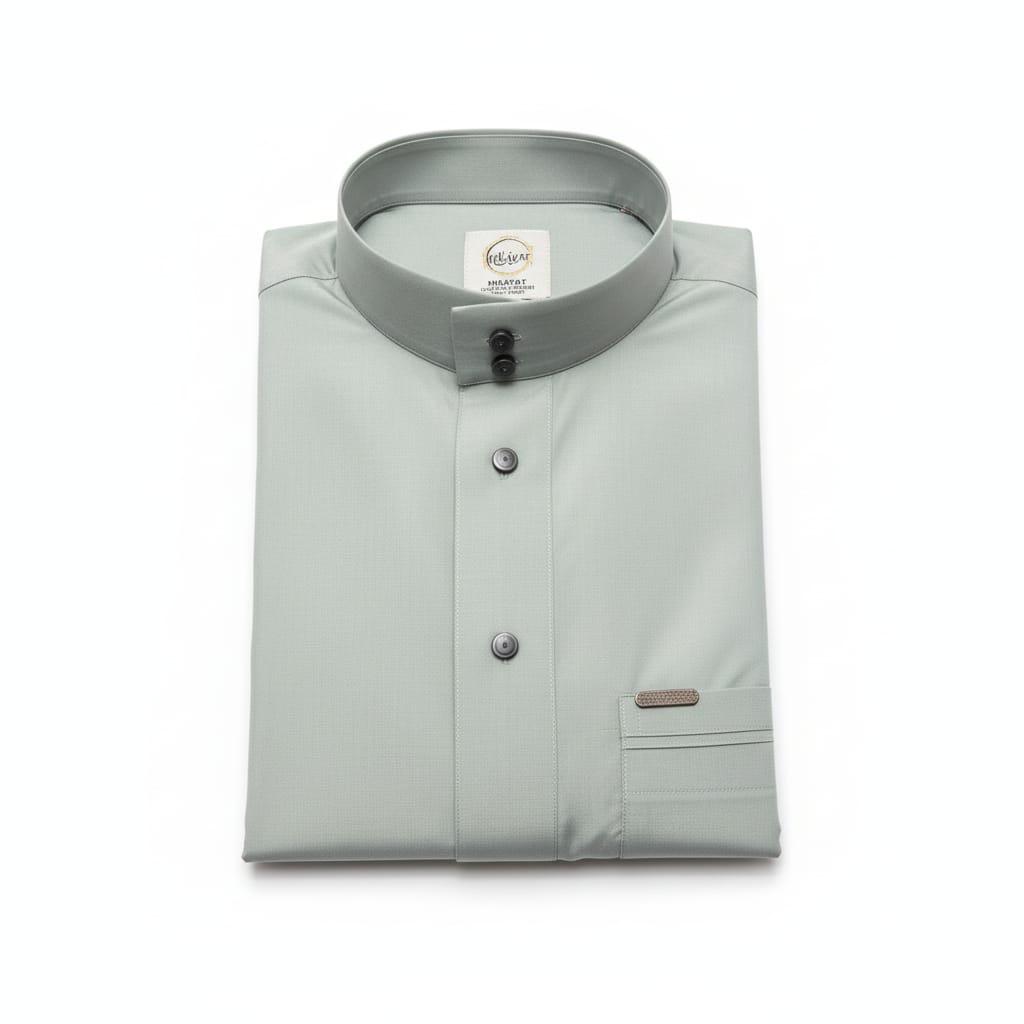 Folded light gray shirt with a collar on a white background