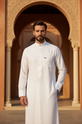 Classic white Saudi thobe with mandarin collar and contrast buttons — premium crisp fit for Eid, Friday prayers & everyday Gulf wear — Hikayat